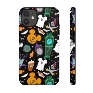 May include: A black phone case with a Halloween-themed pattern featuring Mickey Mouse, ghosts, candy, and a clock. The pattern is repeated on the back and sides of the case.