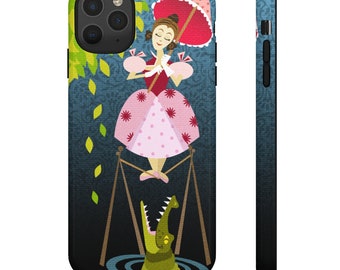 May include: A phone case with a colorful illustration of a woman in a pink dress and a red umbrella, standing on a tightrope over a crocodile's open mouth.