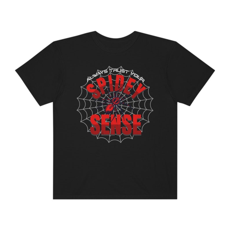 May include: Black t-shirt with a red spider web design and the text "Always Trust Your Spidey Sense".