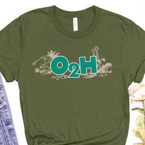 May include: Green t-shirt with a graphic of animals and the text "O2H" in green.