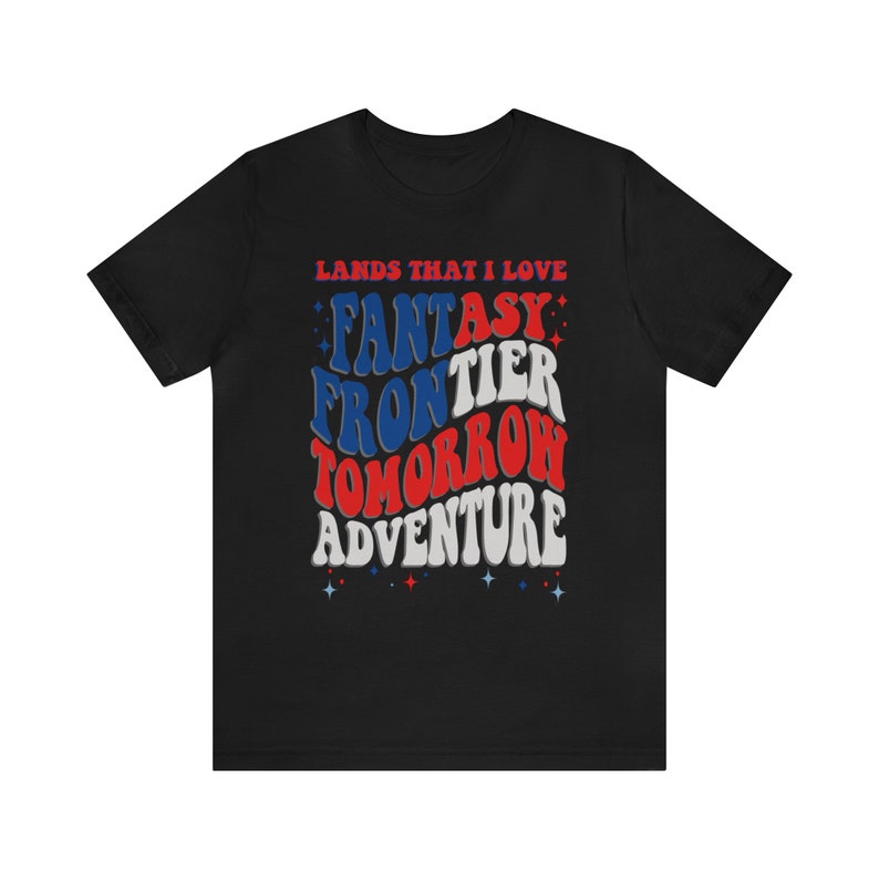 May include: Black t-shirt with a red, white, and blue graphic that says "Lands That I Love" and "Fantasy Frontier Tomorrow Adventure".