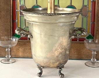 Rare footed ice bucket. Antique silver plated champagne bucket with clawed feet