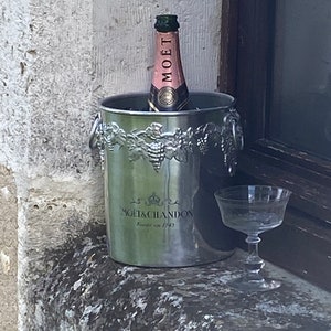 Moet et Chandon champagne bucket in light weight aluminium. Crafted by meaux Argit. Moet name engraved both sides.