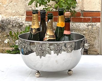 Vasca da bagno vintage italiana con piedini a sfera, ideale per champagne.