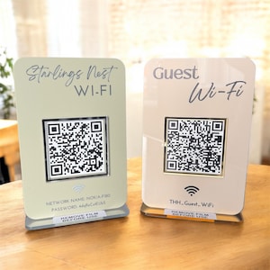 May include: A set of three ceramic mugs with a speckled, matte finish. The mugs are in shades of cream, light grey, and dark grey. Each mug has a simple, minimalist design, ideal for coffee or tea.