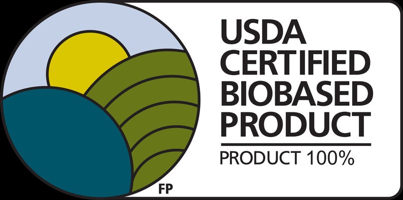 May include: A white rectangular graphic with the text "USDA CERTIFIED BIOBASED PRODUCT PRODUCT 100%". The graphic includes a circular design with a yellow sun, green hills, and blue water.