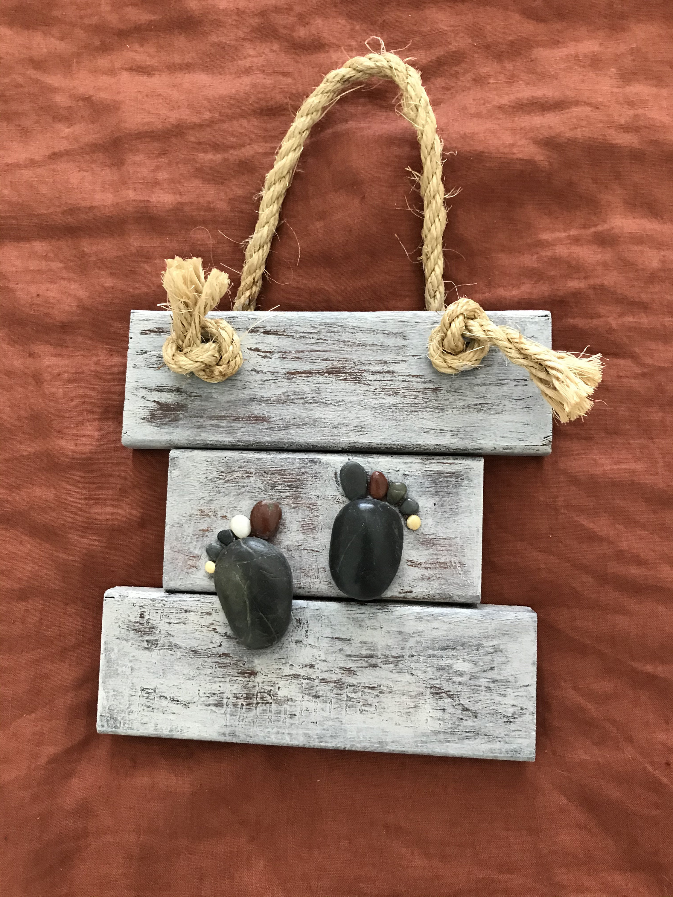 Handcrafted rock art wall hangings created from recycled wood | Etsy