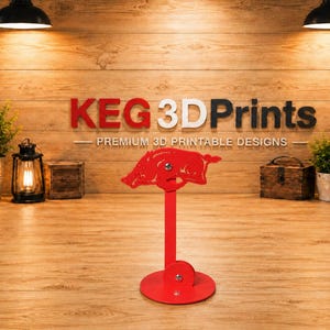May include: A bright red, flat-surfaced decorative stand featuring a cutout silhouette of a charging razorback hog mounted on a vertical post attached to a circular base. The object is constructed with visible metal hardware connecting the components.