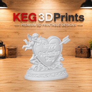 May include: A white 3D printed decorative sculpture featuring a heart shape with the embossed text Happy Valentine Day. A small cherub figure with a bow and arrow is attached to the side, and an arrow pierces the heart. The base has floral details.