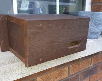 Swallow or swift nest boxes