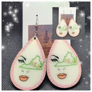 AKA states earrings on wood