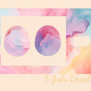 May include: A set of three pastel-colored decals with a watercolor-like design. The decals are shaped like eggs and have a white outline. The text "3 Gals Decals" is printed in a light orange color at the bottom of the image.