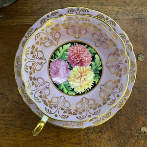 Pink Paragon tea cup and saucer set with chrysanthemum flowers