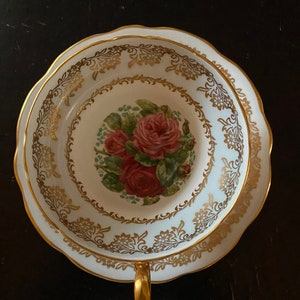 Vintage Foley tea cup and saucer set with roses sign by artist