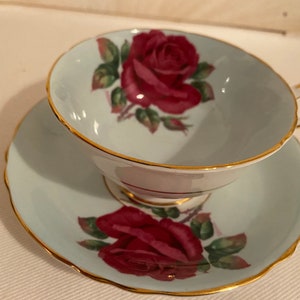 Paragon tea cup and saucer set Johnson rose sign