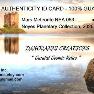 May include: An authenticity ID card for a Mars Meteorite NEA 053 from the Noyes Planetary Collection 2026. The card features a landscape image of a castle on a lake, the text DANOVANNI CREATIONS, and contact details for Daniel Noyes.