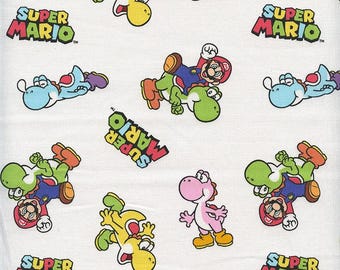 May include: White fabric with a repeating pattern of Super Mario characters. The characters include Mario, Luigi, Yoshi, and a pink dinosaur. The text "Super Mario" appears in the pattern.