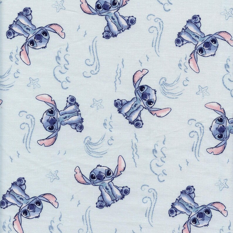 May include: Light blue fabric featuring a repeating pattern of the character Stitch from Lilo & Stitch. The design includes Stitch in various poses, along with stylized waves and star shapes. The overall aesthetic is playful and whimsical.