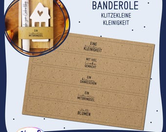 May include: A printable PDF template for a brown paper banderole with the text "BANDEROLE", "KLITZEKLEINE", "KLEINIGKEIT", "EINE KLEINIGKEIT", "MIT VIEL Liebe GEMACHT", "EIN kleiner DANKESCHON", "EIN Liebevoller MITBRINGSEL", and "statt BLUMEN".