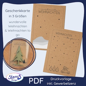 May include: Kraft paper gift cards with the words "wundervolle Weihnachten" and "Weihnachten to go" printed in black. The cards feature star and mountain illustrations. A small, green Christmas tree is visible in a clear plastic package.