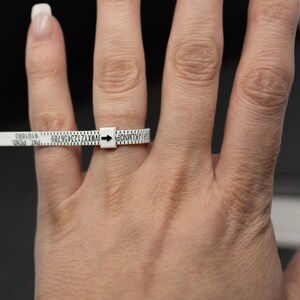 Ring sizer and vial for ashes and opal rings