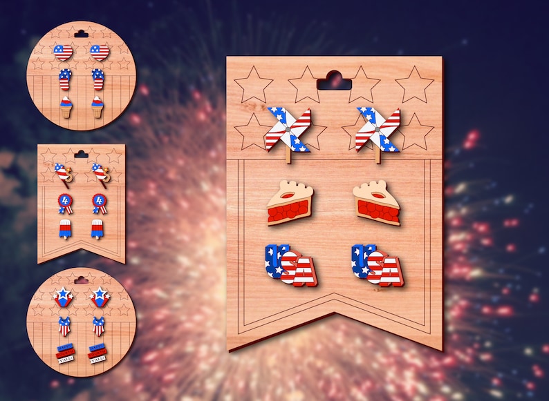 May include: A wooden display card with six pairs of patriotic-themed earrings. The earrings feature designs such as stars, pinwheels, pie slices, and the word "USA".