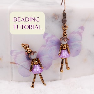 Puede incluir: Pendientes hechos a mano con cuentas con diseño de hada. Los pendientes presentan un cuerpo de metal color cobre, una falda lavanda y una cabeza de cuentas blancas. El texto "BEADING TUTORIAL" está en la esquina superior izquierda.