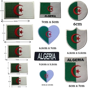 May include: A collection of Algerian flag patches in various shapes and sizes. The patches feature the Algerian flag's green and white design with a red crescent and star. Sizes range from 2cm x 3cm to 11cm x 18cm.