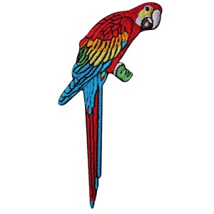 May include: A red, yellow, blue, and green embroidered parrot patch. The parrot is facing right and has a long tail.