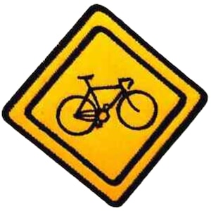 May include: A yellow diamond-shaped road sign with a black border and a black bicycle silhouette inside.