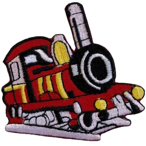 May include: A red and yellow toy train with a black wheel and white smoke stack. The train is on a white track.