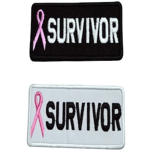 May include: Two embroidered patches featuring a pink ribbon and the word "SURVIVOR" in white lettering. The patches are on black and white backgrounds.