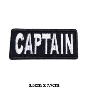 May include: Black embroidered patch with white lettering that reads "CAPTAIN". The patch is 3.5 inches by 7.7 inches.