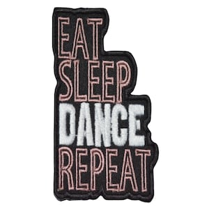 May include: Black and pink embroidered patch with the text "Eat Sleep Dance Repeat".