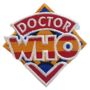 May include: An embroidered patch featuring the words "Doctor Who" in white, with a red, yellow and blue colour scheme.
