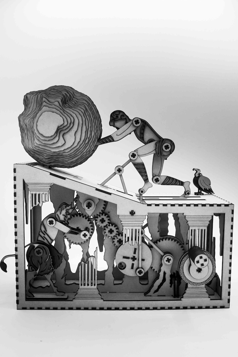 May include: A wooden model of a mythological scene with a figure pushing a large stone up a ramp. The model features intricate details, including gears, columns, and a bird.