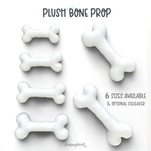 May include: White plush bone props in various sizes are displayed on a white background. The text "PLUSH BONE PROP" is at the top. The text "6 SIZES AVAILABLE & OPTIONAL SQUEAKER" is on the right. The props are for pets.