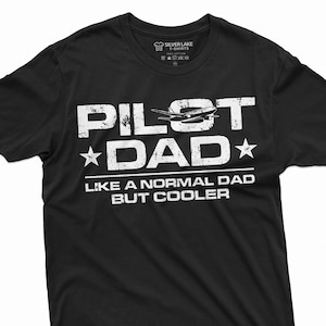May include: Black t-shirt with white text that reads "Pilot Dad" with a small airplane graphic and the text "Like a normal dad but cooler".