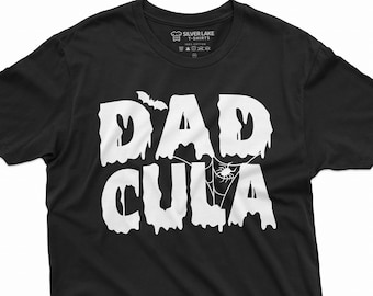 May include: Black t-shirt with a white graphic that says "DADCULA" with a spider web and a bat.