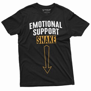 May include: Black t-shirt with the text "Emotional Support Snake" in white with a yellow arrow pointing down.