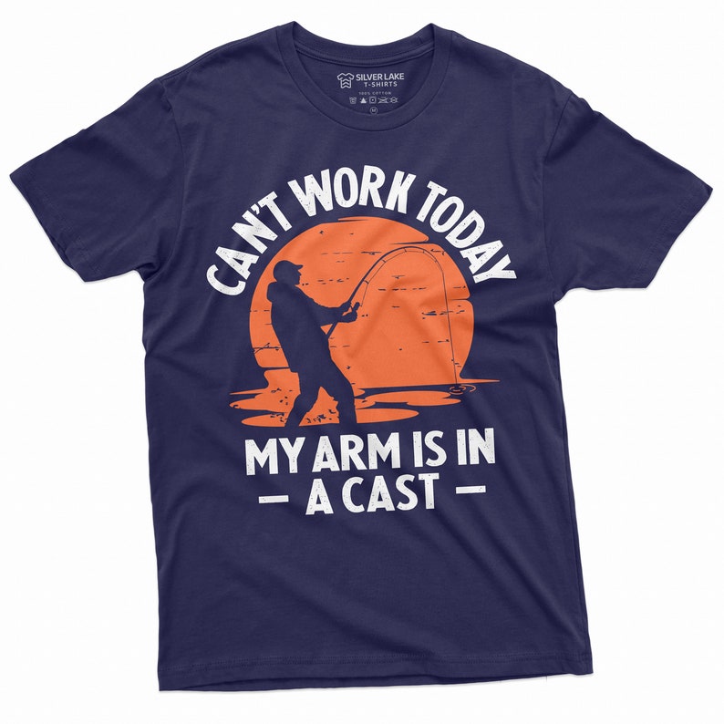 May include: A navy blue t-shirt with a white graphic of a person fishing with the text "Can't work today my arm is in a cast".