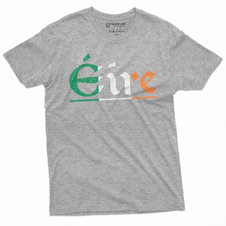 May include: A heather gray t-shirt with the word "&Eacute;ire" printed in green, white, and orange, resembling the Irish flag.