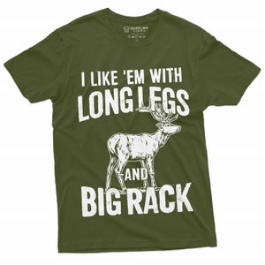 May include: A green t-shirt with a white graphic of a deer with the text "I like 'em with long legs and big rack".