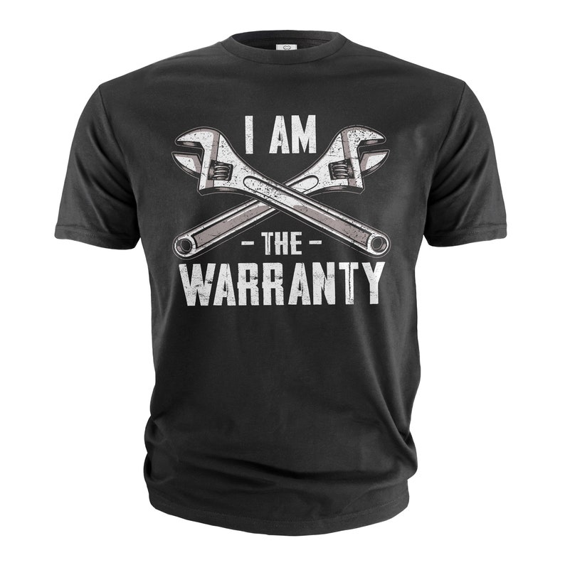 May include: Black t-shirt with a white graphic of two crossed wrenches and the text "I AM - THE - WARRANTY".