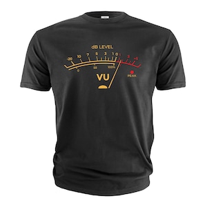 May include: Black t-shirt with a graphic of a vintage VU meter with the text "dB LEVEL" and "PEAK" printed on it.