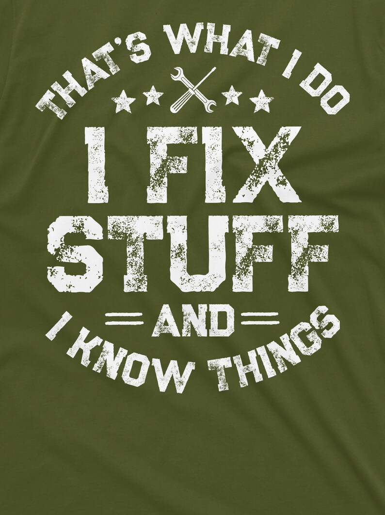 May include: A green t-shirt with a white distressed graphic that says "That's what I do I fix stuff and I know things". The graphic also includes a wrench and screwdriver crossed over each other and four stars.