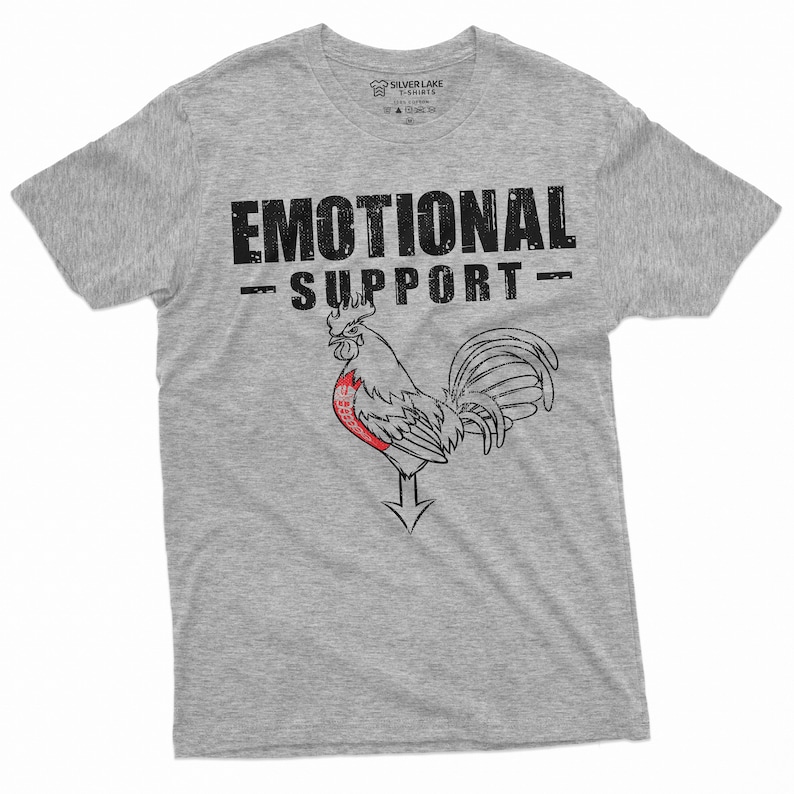 May include: A gray t-shirt with the text "Emotional Support" and a rooster illustration with a red heart on its chest.