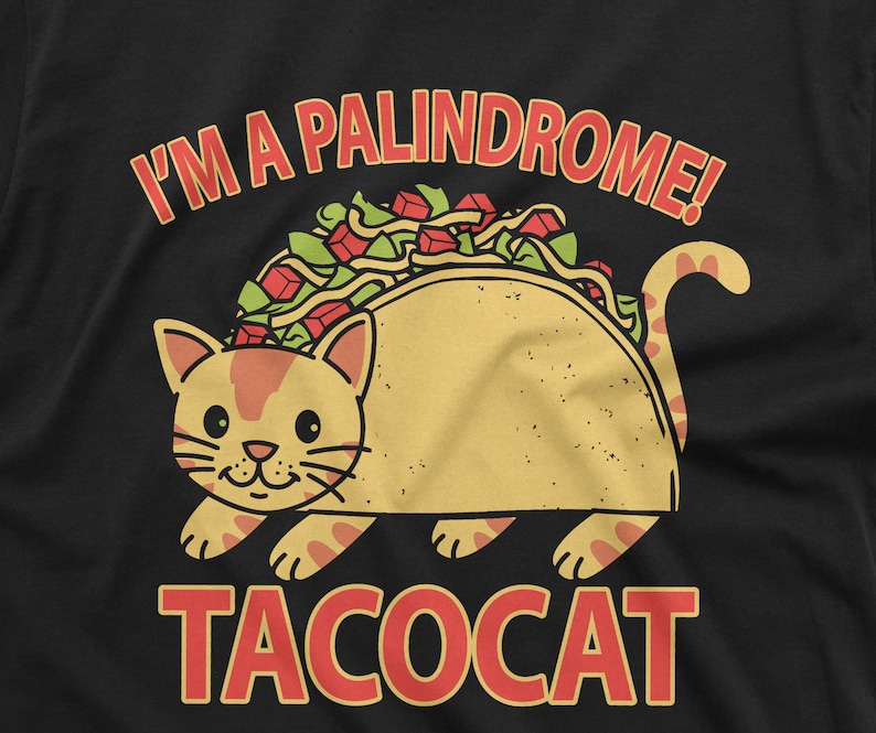 May include: A black t-shirt with a yellow and brown taco cat illustration. The text "I'm a palindrome!" is above the cat and the text "tacocat" is below the cat.