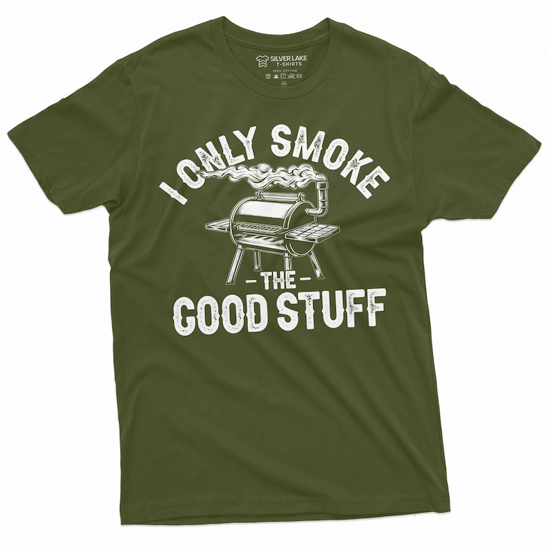 May include: A green t-shirt with a white graphic of a grill with smoke coming out of it. The text on the shirt reads "I only smoke the good stuff".