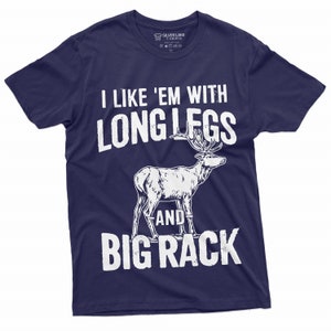 May include: A navy blue t-shirt with a white graphic of a deer with the text "I like 'em with long legs and big rack".